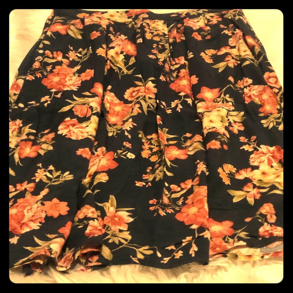 Mid length floral skirt.
